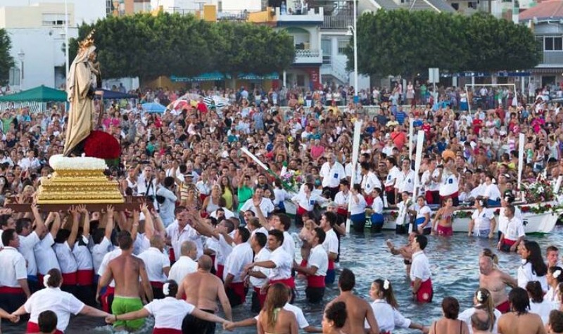 Malaga Province Engages in Spectacular Virgen del Carmen Festivities, Illuminating Streets and Shores